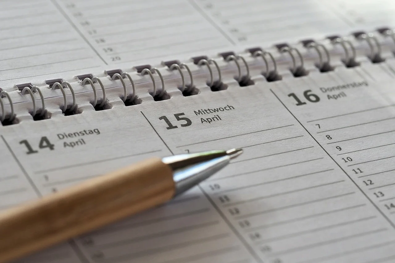 A person planning their day in a notebook in 10 minutes